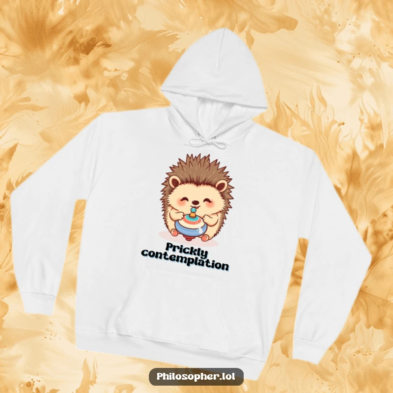Funny hedgehog hoodie featuring a happy hedgehog contemplating a spinning top, providing cozy warmth and playful charm.