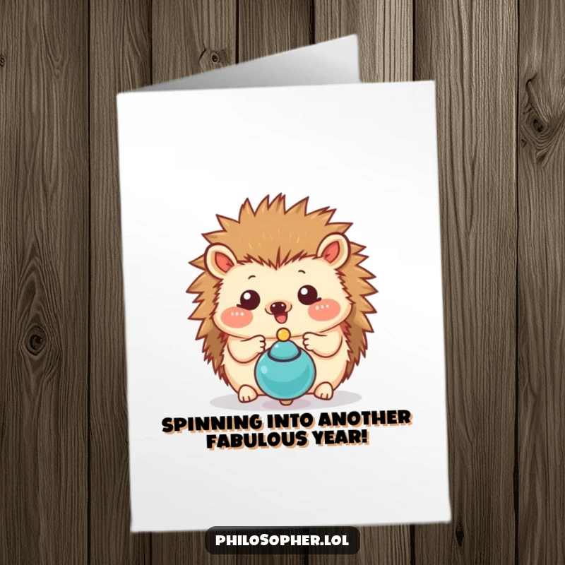Funny Free Printable Hedgehog Birthday Card featuring a cute hedgehog mesmerized by a spinning top, perfect for download.