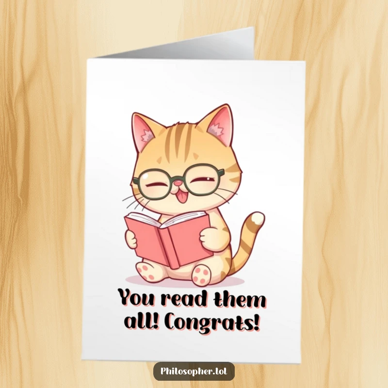 Funny free printable congratulations card of a giggling cat in spectacles reading a small book. For celebrating clever wins.