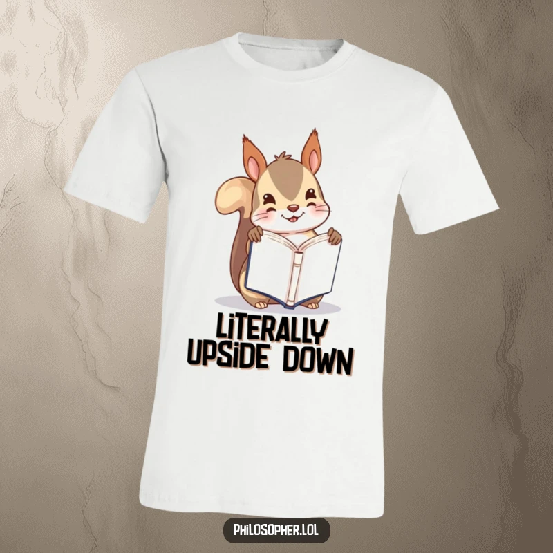 Funny t-shirt with a playful squirrel holding a tiny book upside down, showcasing a quirky reading habit, perfect gift.